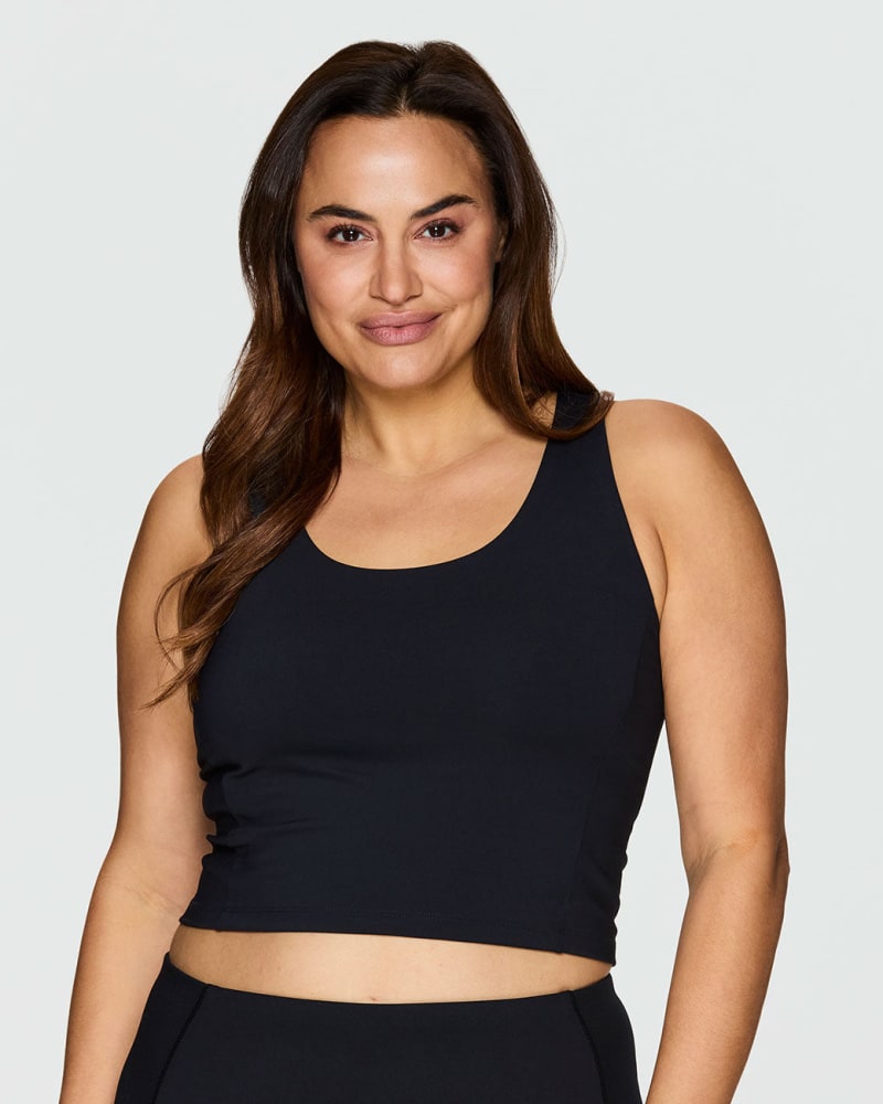 Front of a model wearing a size 1X Super Soft Longline Bra in Black by RBX Active. | dia_product_style_image_id:244644